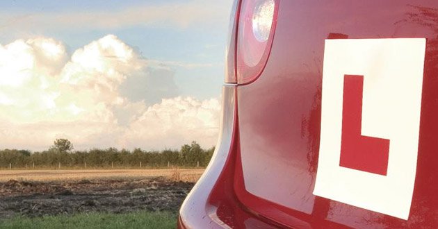 L-plate on back of car.