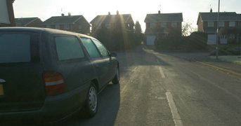 Low sun in a residential street.